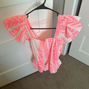 Francesca’s pink and white blouse